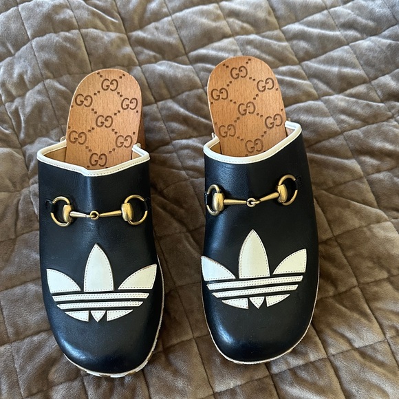 Gucci Shoes - Gucci Adidas Black and White Slip-On Shoes with Gold Accents clogs sz 39 us 9.